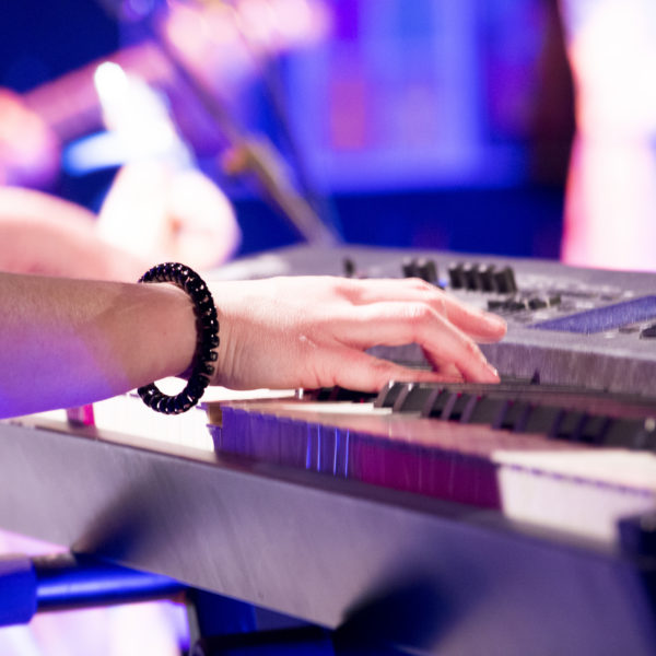 hands at the keyboard during music performance
